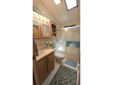 WELL KEPT CHARIOT MOBILE HOME IN ACTIVE 55+ COMMUNITY! One on River Run Golf Links in Florida - for sale on GolfHomes.com, golf home, golf lot
