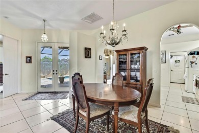 RECENT PRICE REDUCTION!! Looking for a place with tropical on Glen Lakes Country Club in Florida - for sale on GolfHomes.com, golf home, golf lot