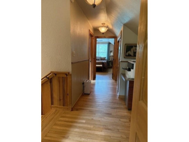 This private and peaceful lakefront home is located in the piney on Pine Dunes Golf Course in Texas - for sale on GolfHomes.com, golf home, golf lot