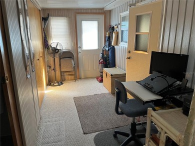 WELL KEPT CHARIOT MOBILE HOME IN ACTIVE 55+ COMMUNITY! One on River Run Golf Links in Florida - for sale on GolfHomes.com, golf home, golf lot