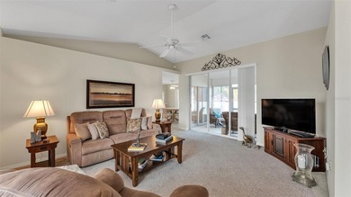 Well-maintained home featuring carpet flooring and a comfortable on Sandpiper Golf Club in Florida - for sale on GolfHomes.com, golf home, golf lot