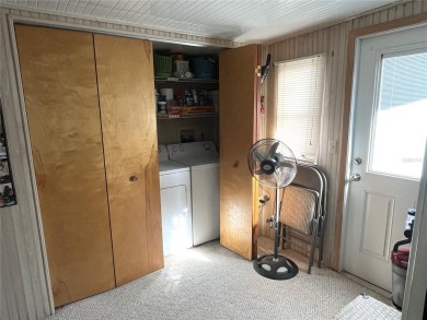 WELL KEPT CHARIOT MOBILE HOME IN ACTIVE 55+ COMMUNITY! One on River Run Golf Links in Florida - for sale on GolfHomes.com, golf home, golf lot