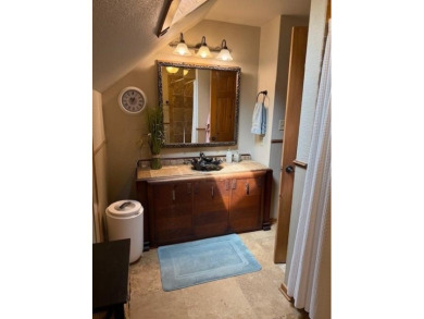 This private and peaceful lakefront home is located in the piney on Pine Dunes Golf Course in Texas - for sale on GolfHomes.com, golf home, golf lot