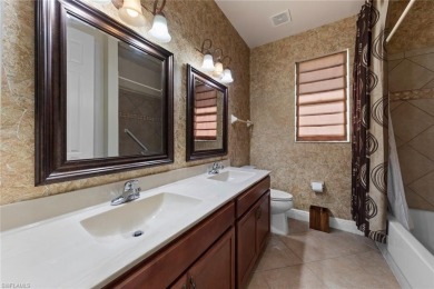 Step inside to this Rarely available Toll Brothers St. Lawrence on Estero Country Club in Florida - for sale on GolfHomes.com, golf home, golf lot