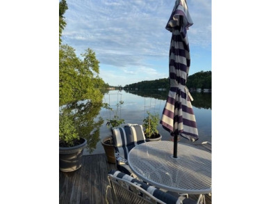 This private and peaceful lakefront home is located in the piney on Pine Dunes Golf Course in Texas - for sale on GolfHomes.com, golf home, golf lot