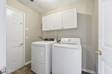 Welcome to one of Eagle Harbor's most conveniently located on Eagle Harbor Golf Club in Florida - for sale on GolfHomes.com, golf home, golf lot