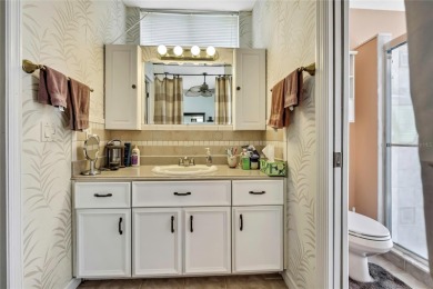 RECENT PRICE REDUCTION!! Looking for a place with tropical on Glen Lakes Country Club in Florida - for sale on GolfHomes.com, golf home, golf lot