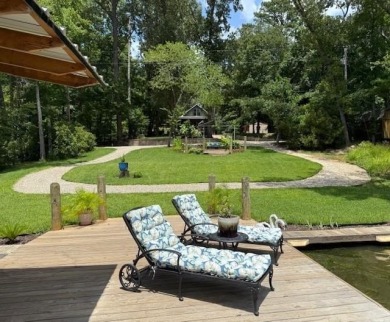 This private and peaceful lakefront home is located in the piney on Pine Dunes Golf Course in Texas - for sale on GolfHomes.com, golf home, golf lot