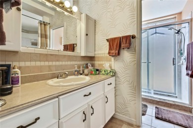 RECENT PRICE REDUCTION!! Looking for a place with tropical on Glen Lakes Country Club in Florida - for sale on GolfHomes.com, golf home, golf lot