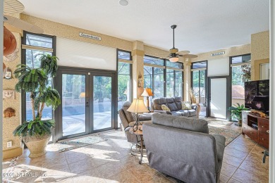 A custom built POOL home on close to 1/2 acre in the wooded area on Magnolia Point Golf and Country Club in Florida - for sale on GolfHomes.com, golf home, golf lot