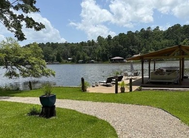 This private and peaceful lakefront home is located in the piney on Pine Dunes Golf Course in Texas - for sale on GolfHomes.com, golf home, golf lot