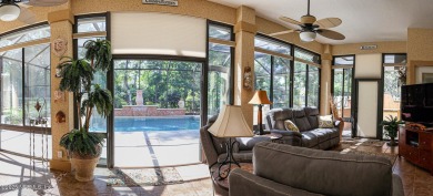 A custom built POOL home on close to 1/2 acre in the wooded area on Magnolia Point Golf and Country Club in Florida - for sale on GolfHomes.com, golf home, golf lot