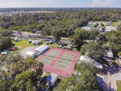 WELL KEPT CHARIOT MOBILE HOME IN ACTIVE 55+ COMMUNITY! One on River Run Golf Links in Florida - for sale on GolfHomes.com, golf home, golf lot