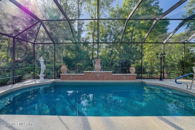 A custom built POOL home on close to 1/2 acre in the wooded area on Magnolia Point Golf and Country Club in Florida - for sale on GolfHomes.com, golf home, golf lot