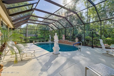 A custom built POOL home on close to 1/2 acre in the wooded area on Magnolia Point Golf and Country Club in Florida - for sale on GolfHomes.com, golf home, golf lot