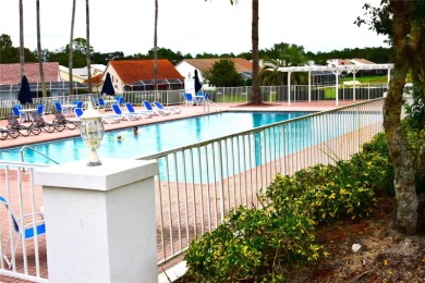 RECENT PRICE REDUCTION!! Looking for a place with tropical on Glen Lakes Country Club in Florida - for sale on GolfHomes.com, golf home, golf lot