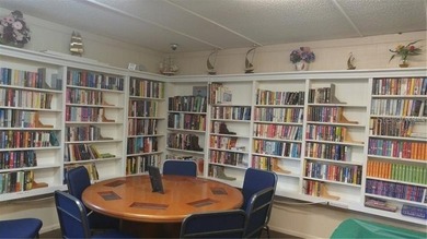 WELL KEPT CHARIOT MOBILE HOME IN ACTIVE 55+ COMMUNITY! One on River Run Golf Links in Florida - for sale on GolfHomes.com, golf home, golf lot