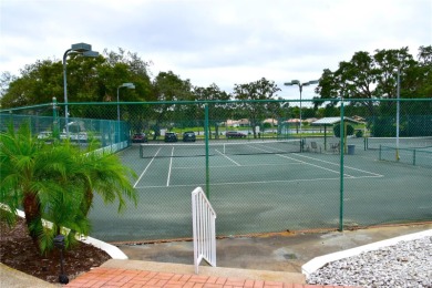 RECENT PRICE REDUCTION!! Looking for a place with tropical on Glen Lakes Country Club in Florida - for sale on GolfHomes.com, golf home, golf lot