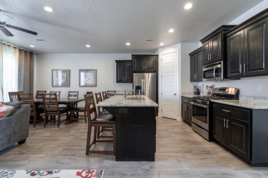 Discover your dream getaway with this beautiful vacation rental on The Ledges Golf Club in Utah - for sale on GolfHomes.com, golf home, golf lot