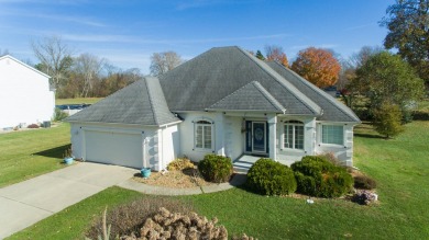 This stunning home situated on a well-manicured 1 acre lot is on Paw Paw Lake Golf Course in Michigan - for sale on GolfHomes.com, golf home, golf lot