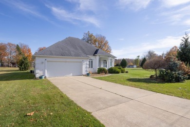 This stunning home situated on a well-manicured 1 acre lot is on Paw Paw Lake Golf Course in Michigan - for sale on GolfHomes.com, golf home, golf lot