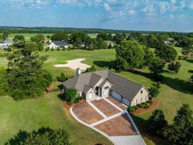 Discover luxury living at its finest in this custom-built home on Red Eagle Golf Course in Alabama - for sale on GolfHomes.com, golf home, golf lot