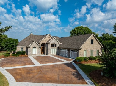 Discover luxury living at its finest in this custom-built home on Red Eagle Golf Course in Alabama - for sale on GolfHomes.com, golf home, golf lot