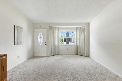 Beautiful 2-bedroom, 2-bath home located on a golf course in a on Highland Fairways Golf Club in Florida - for sale on GolfHomes.com, golf home, golf lot