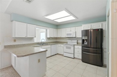 Beautiful 2-bedroom, 2-bath home located on a golf course in a on Highland Fairways Golf Club in Florida - for sale on GolfHomes.com, golf home, golf lot