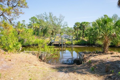 Seize the opportunity to own a prime .46-acre waterfront lot on Sabal Trace Golf and Country Club in Florida - for sale on GolfHomes.com, golf home, golf lot