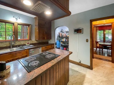 This stunning all-brick 3-bedroom, 2.5-bathroom home built in on Sinnissippi Park Golf Course in Illinois - for sale on GolfHomes.com, golf home, golf lot