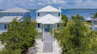 Come home to this Southern charmer on Old River--one of Perdido on Lost Key Golf Club in Florida - for sale on GolfHomes.com, golf home, golf lot