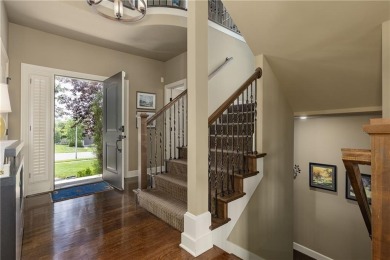 This 2-story home in Chapel Hill sits on a large cul-de-sac lot on Heritage Park Golf Course in Kansas - for sale on GolfHomes.com, golf home, golf lot