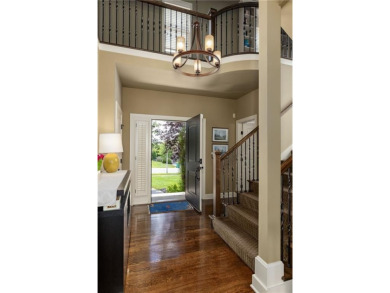 This 2-story home in Chapel Hill sits on a large cul-de-sac lot on Heritage Park Golf Course in Kansas - for sale on GolfHomes.com, golf home, golf lot