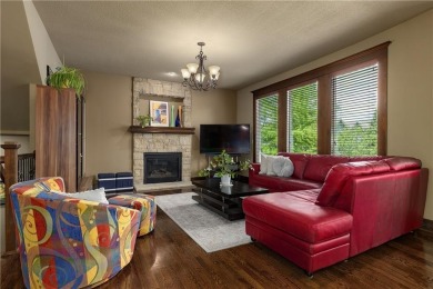 This 2-story home in Chapel Hill sits on a large cul-de-sac lot on Heritage Park Golf Course in Kansas - for sale on GolfHomes.com, golf home, golf lot