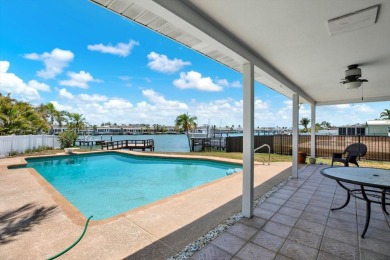 WATERFRONT POOL HOME IN HIGHLY DESIRABLE OAKHURST SHORES! on The Tides Golf Club in Florida - for sale on GolfHomes.com, golf home, golf lot