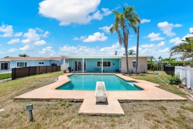WATERFRONT POOL HOME IN HIGHLY DESIRABLE OAKHURST SHORES! on The Tides Golf Club in Florida - for sale on GolfHomes.com, golf home, golf lot