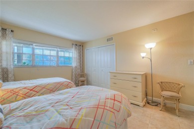 BEAUTIFUL CHARMING 2/2 CONDO WITH PEACEFUL VIEW OF THE LAKE on Palm-Aire Country Club and Resort - Palms in Florida - for sale on GolfHomes.com, golf home, golf lot