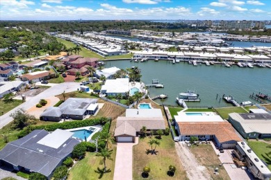 WATERFRONT POOL HOME IN HIGHLY DESIRABLE OAKHURST SHORES! on The Tides Golf Club in Florida - for sale on GolfHomes.com, golf home, golf lot