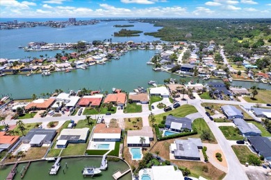WATERFRONT POOL HOME IN HIGHLY DESIRABLE OAKHURST SHORES! on The Tides Golf Club in Florida - for sale on GolfHomes.com, golf home, golf lot