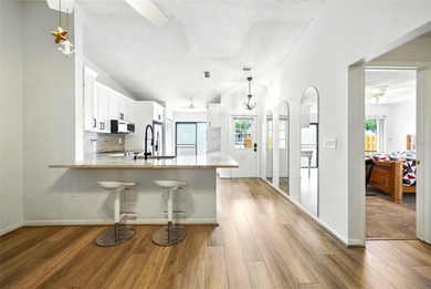 Welcome to this beautifully remodeled villa in the heart of Palm on Highland Lakes Executive Golf Course in Florida - for sale on GolfHomes.com, golf home, golf lot