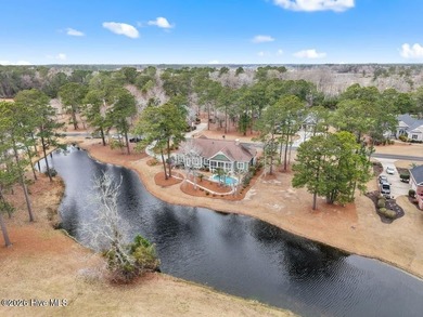 Panoramic water and golf course views set the stage for this on Ocean Ridge Plantation in North Carolina - for sale on GolfHomes.com, golf home, golf lot