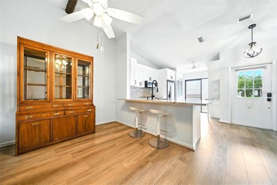 Welcome to this beautifully remodeled villa in the heart of Palm on Highland Lakes Executive Golf Course in Florida - for sale on GolfHomes.com, golf home, golf lot