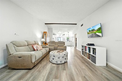 Welcome to this beautifully remodeled villa in the heart of Palm on Highland Lakes Executive Golf Course in Florida - for sale on GolfHomes.com, golf home, golf lot