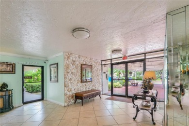 BEAUTIFUL CHARMING 2/2 CONDO WITH PEACEFUL VIEW OF THE LAKE on Palm-Aire Country Club and Resort - Palms in Florida - for sale on GolfHomes.com, golf home, golf lot