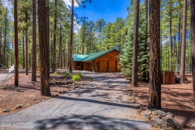 Pinetop Country Club stunning log cabin designed for comfort on Pinetop Lakes Country Club in Arizona - for sale on GolfHomes.com, golf home, golf lot