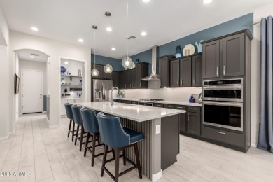 This stunning Journey model is filled with thoughtful upgrades on Copper Canyon Golf Club in Arizona - for sale on GolfHomes.com, golf home, golf lot