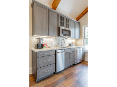 Seize a rare opportunity to own a revenue-generating 4 Bedroom on McLemore Golf Club in Georgia - for sale on GolfHomes.com, golf home, golf lot