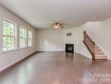 Welcome home to Killian Creek! Large, rocking chair, covered on Verdict Ridge Golf and Country Club in North Carolina - for sale on GolfHomes.com, golf home, golf lot