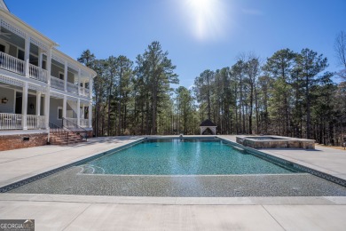 Welcome to 1011 Dogwood Drive, where history meets modern luxury on Reynolds Lake Oconee - The Plantation in Georgia - for sale on GolfHomes.com, golf home, golf lot